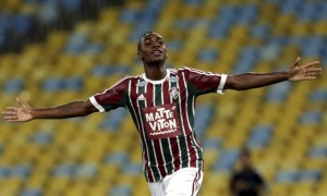 Gerson comemora um gol em jogo no Maracanã (Foto: Cezar Loureiro / Agência O Globo)